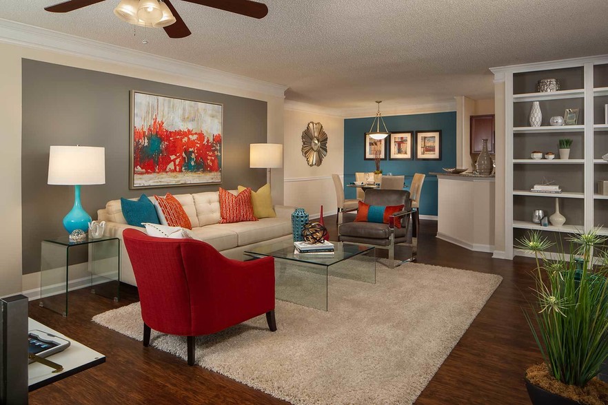 Built-in Bookshelves in a large living room with an open concept - Wood Bridge Apartments