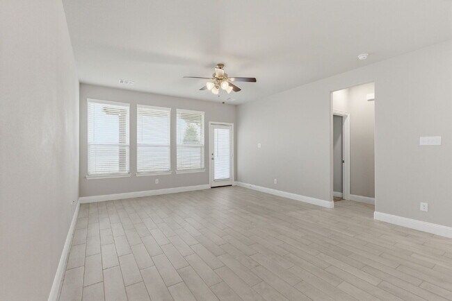 Building Photo - "Open-Concept 4-Bedroom, 2.5-Bath with Designer Finishes and Peaceful Greenbelt Views!"