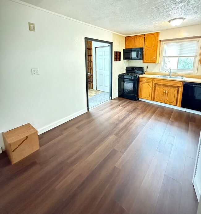 Building Photo - Cozy Main-Floor Living with Garage & Yard