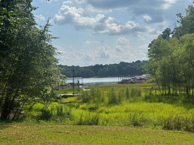Building Photo - Modern Lake Lanier Retreat | 3BR/3.5BA | Private Swim Dock