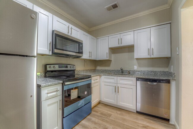 Building Photo - Move-In Special: Qualified Tenants Get 50%...