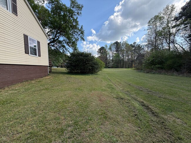 Building Photo - Updated 3BR Home with Office & Large Decks in Haw River