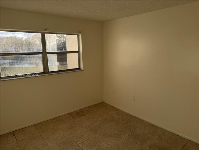 Building Photo - 8100 Sunrise Lakes Blvd