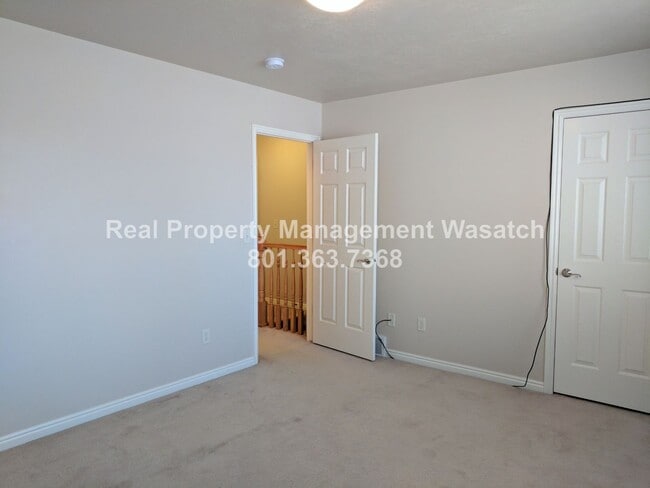Building Photo - Pet Friendly 2 Bed 1.5 Bath Condo in Midvale