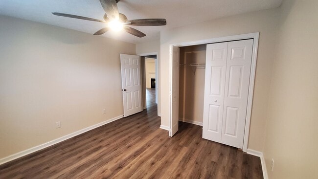 Building Photo - Newly Renovated 3 bedroom, 2 bath unit with fenced in yard and 2 car garage. Recently Reduced to ...