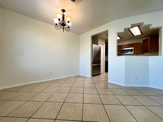 Building Photo - Spacious 3-bedroom, 2-bath condo with acce...