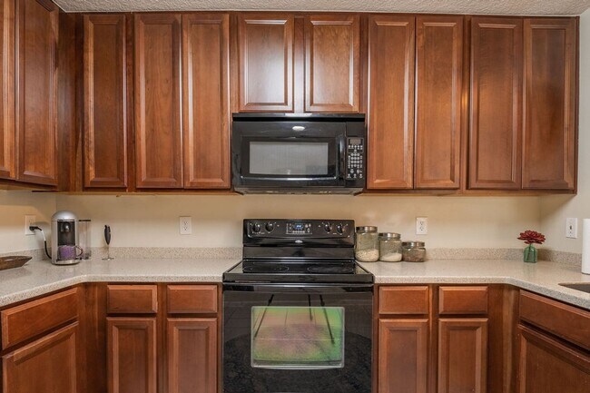 Building Photo - Heron's Landing End Unit Overlooking the Sparkling Community Pool