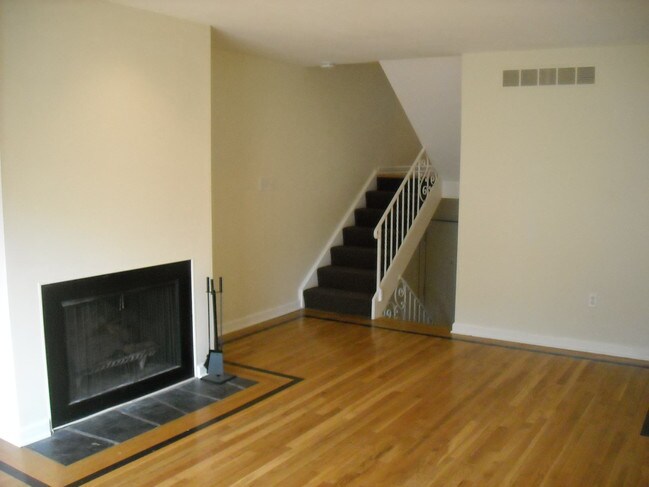 Gleaming hardwood floors in living room - 332 Hailman St