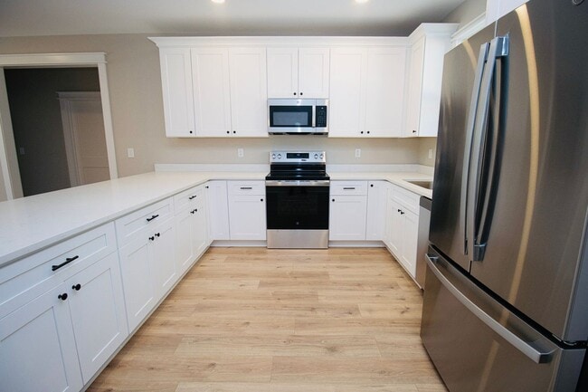 Building Photo - "Welcome to Olympia – Brand New Units! Spe...