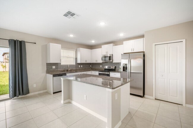 Building Photo - Newer Construction Rental with Open Layout...