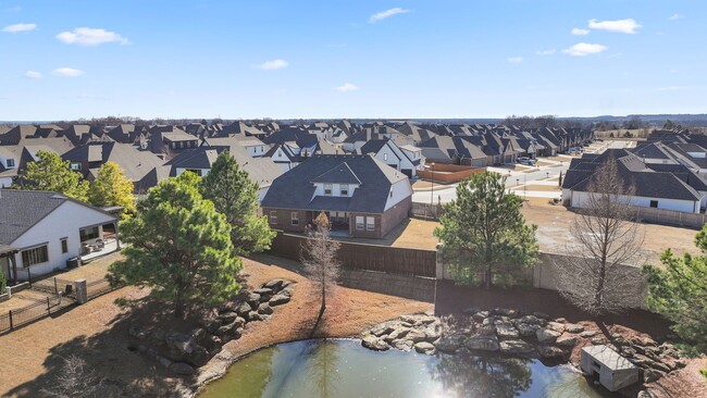 Building Photo - Stunner! This beautiful home features a spacious open floor plan with primary suite and private o...