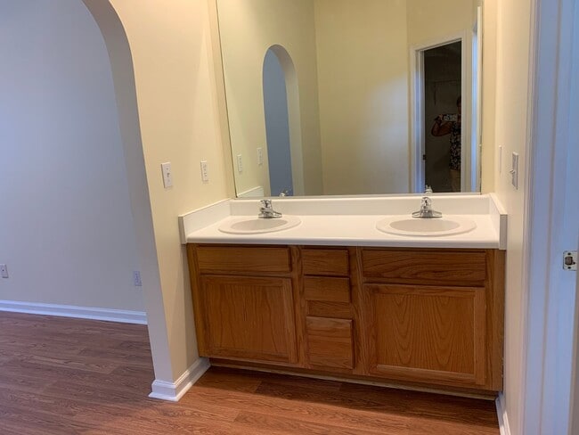 Building Photo - SPACIOUS HOME WITH DOWNSTAIRS PRIMARY BEDROOM AND BATH- LAKE WHEELER/ FARMER'S MARKET AREA