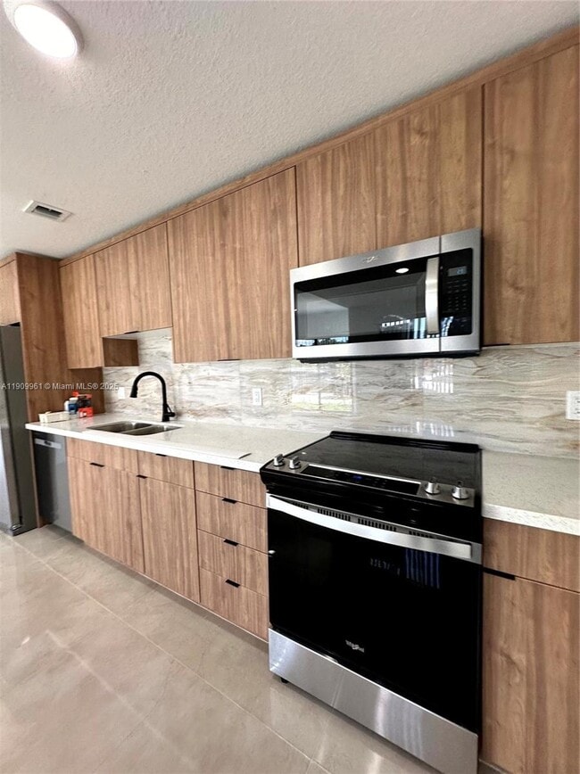 Building Photo - 14577 SW 261 St Ter