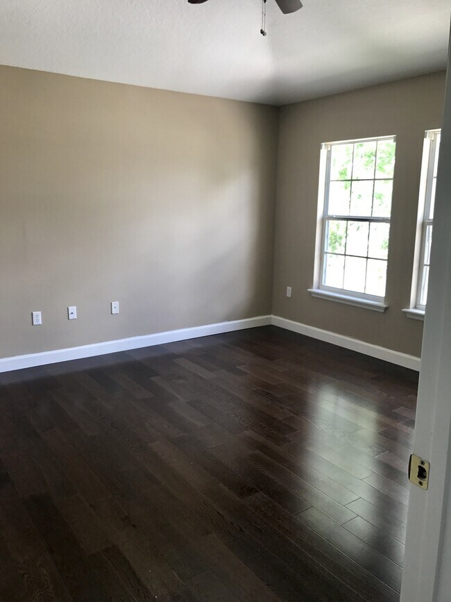 Building Photo - MOVE IN SPECIAL- 2 Bed / 2 Bath Condo with 1-Car Garage in Harmony – Move-In Special!