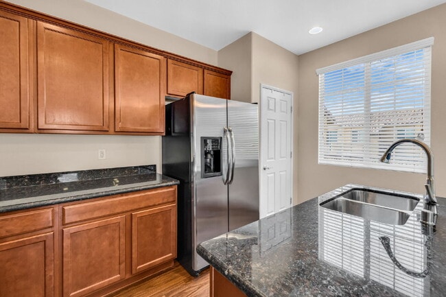 Building Photo - Modern, Guard Gated, and Close to Everything! 3-Bed Townhome Near St. Rose Parkway and Liberty Hi...