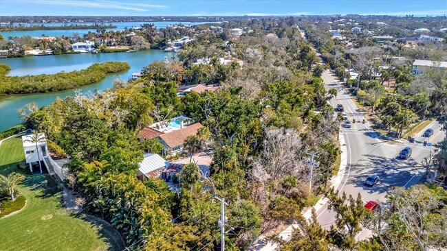 Building Photo - ALL THE CHARM! - Siesta Key 1+ acre on the Bay - 3 bed/ 2 bath pool home