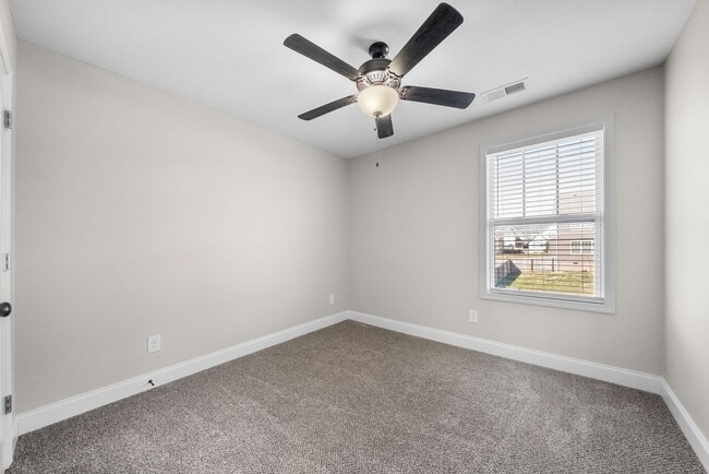 Building Photo - Pet Friendly Three Bedroom with Bonus!