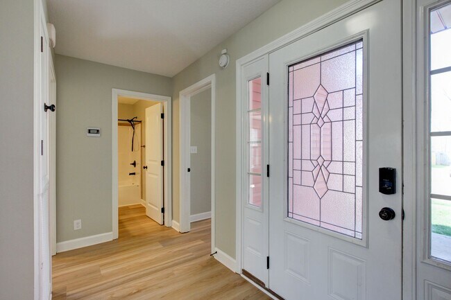 Building Photo - Fantastic Open Floor Plan Home With Stone Front Fireplace, Stainless Steel Appliances, And Close ...