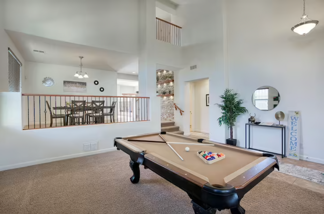 Pool table and dining room - 5831 W Plum Rd