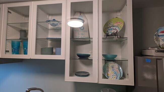 Glass shelves more light to see - 1118 Peachtree St