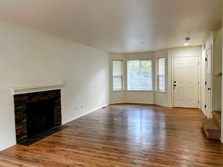 Cozy living space with gas fireplace and bay windows - Make it your own - 1747 Vela Ln SW