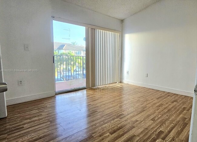 Building Photo - 8575 SW 152nd Ave