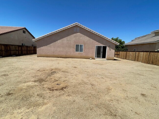 Building Photo - Adelanto Home-3 Bedrooms,2 Bathrooms, Laminate Floors, Indoor Laundry Room, Large Back Yard