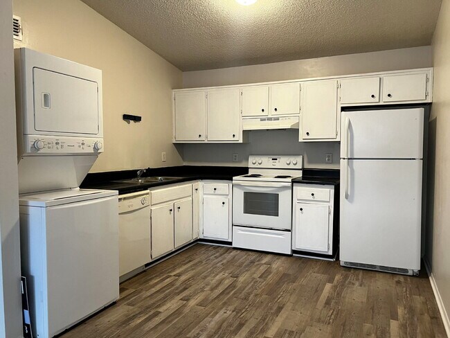 Building Photo - Updated 2BR, 1BA Apartment Off Old Palafox Hwy with LVP Flooring Throughout, Vaulted Ceilings & W...