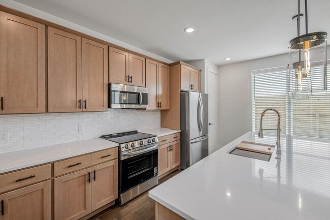 Building Photo - Brand NEW 4 Bedroom 4.5 Bathroom Townhome at The Urban Available for June Pre-lease!