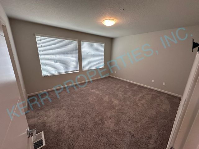 Building Photo - Spacious 3-Bedroom Townhouse with solar power in Happy Valley with 2.5 Bathrooms & 2105 Sq Ft of ...