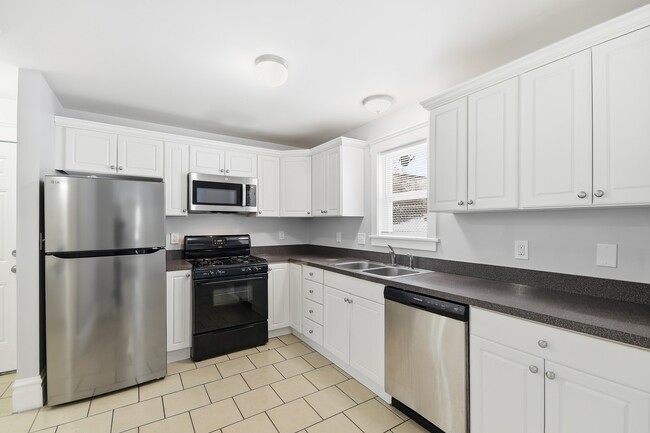 Building Photo - 7148 Kensington Ave