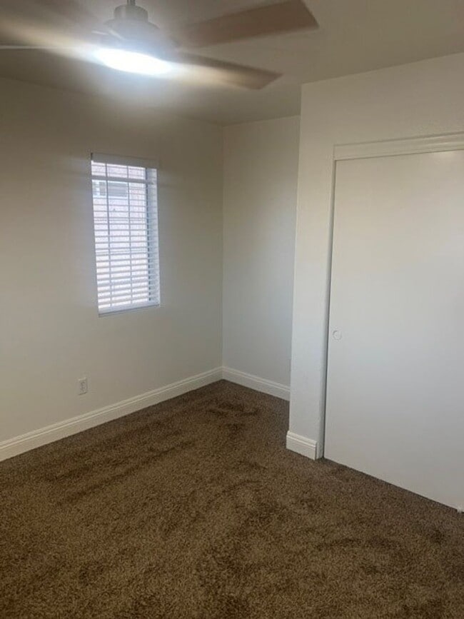 Building Photo - This three bedroom has the primary bedroom on the downstairs level.