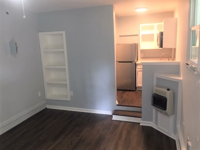 This unit is an open concept with a step us to the kitchen - 3819 Gallatin Pike