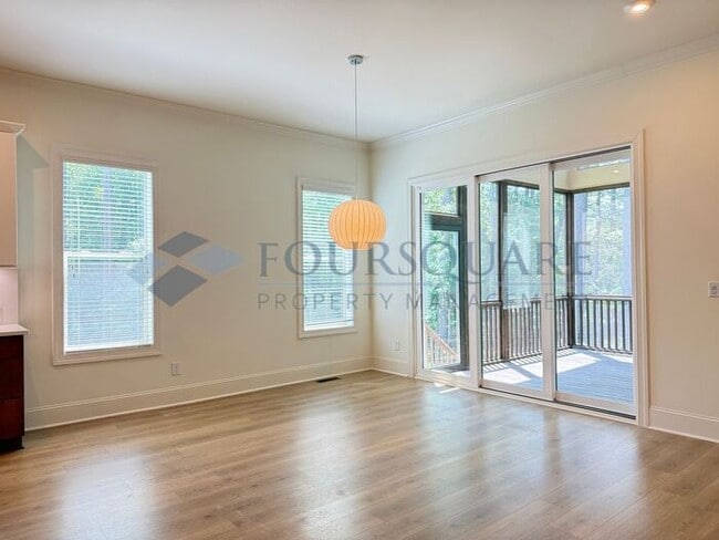 Building Photo - Beautiful  3-Bedroom Home with Loft, Screened Deck & Fenced Backyard – Convenient to Duke Univers...