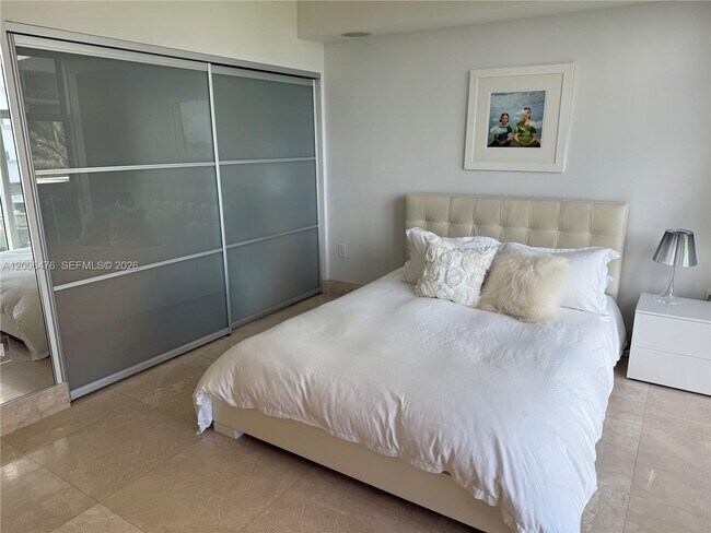 Building Photo - 10275 Collins Ave