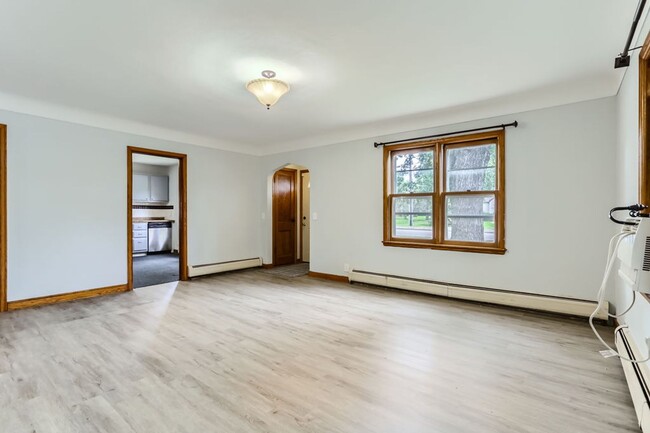 Building Photo - Lovely 4BR Home on a Quiet, Tree-Lined Street