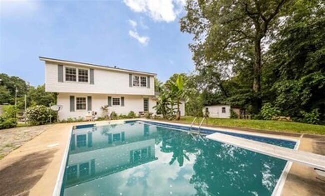 Building Photo - 4 bed & 2.5 bath with a pool