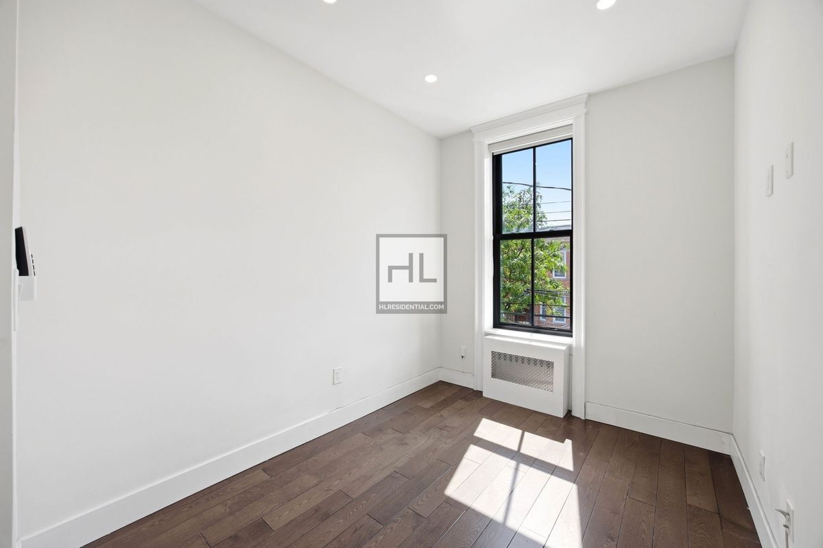 Building Photo - 74-43 61 STREET