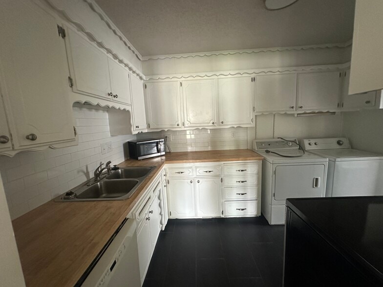 Looking into kitchen from living room - 5103 N Beaver Ave