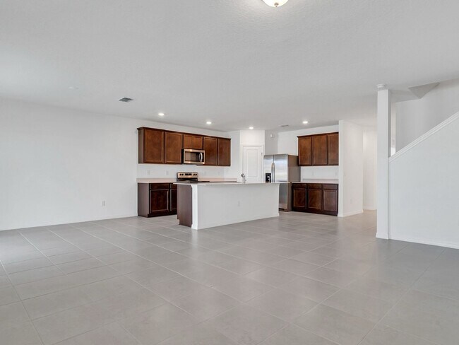 Building Photo - Stunning 4-Bedroom Home with Pond Views in...