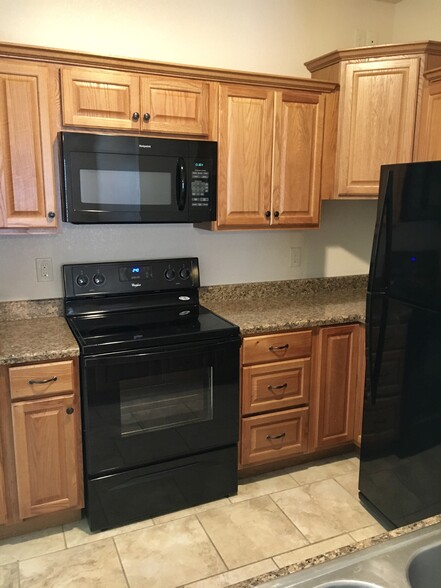 Electric, glass stove top - 1305 Kings Way