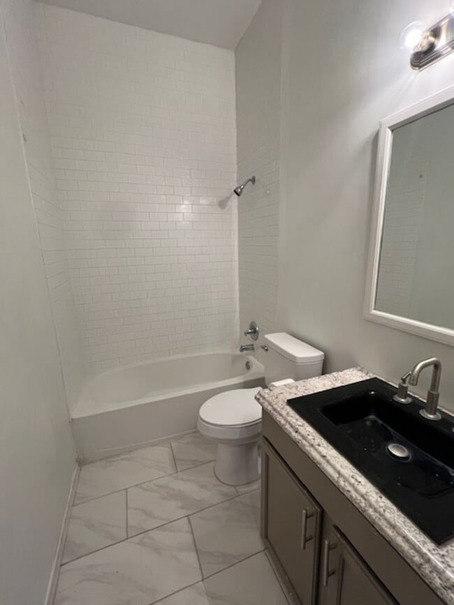 Building Photo - Can’t get any closer to Downtown Albuquerque, two bedroom one bath duplex