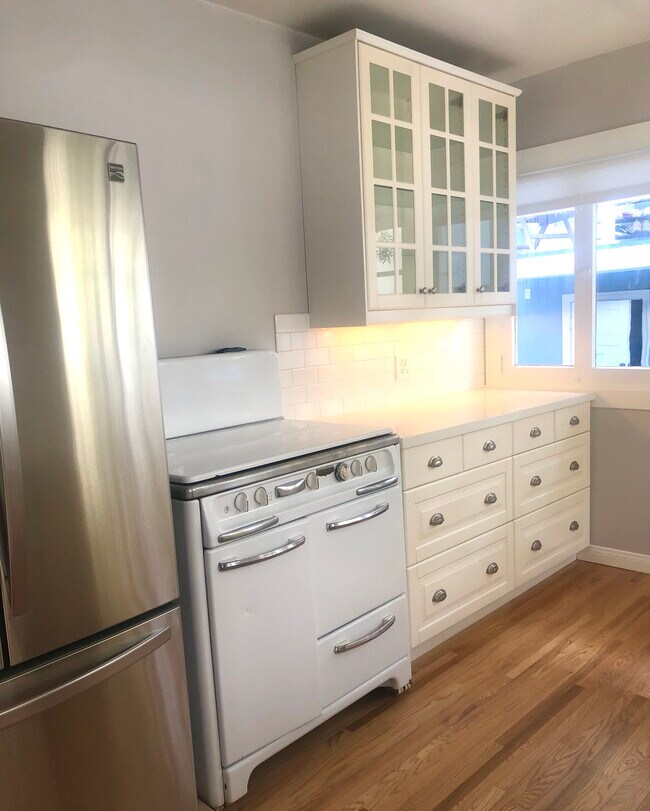 Vintage 36" gas range w/griddle, stainless steel 36" french door fridge - 232 Market St