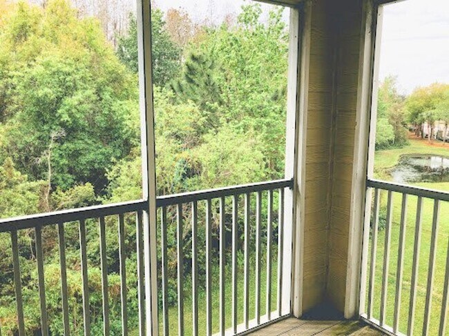 Building Photo - Move-In Ready Condo in Gated Equestrian Pa...