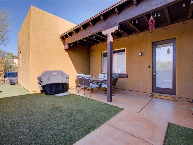Building Photo - Fully Furnished 3BR Retreat with Outdoor Living & Resort-Style Amenities