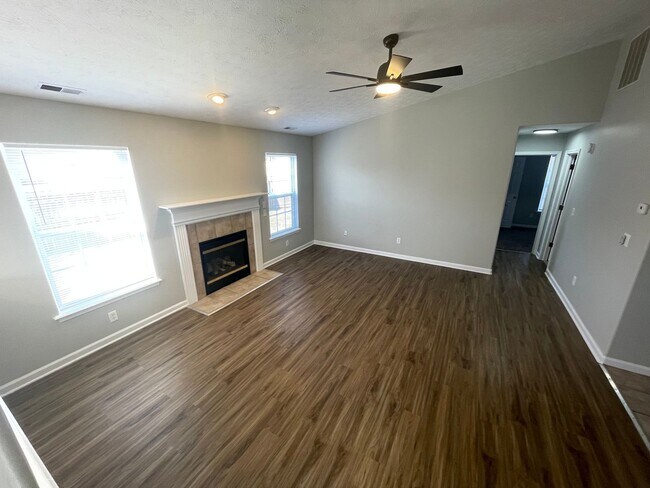 Building Photo - SUBLEASE - Three Bedroom Single Family Home with Fenced Backyard