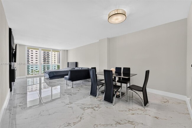 Building Photo - 19380 Collins Ave