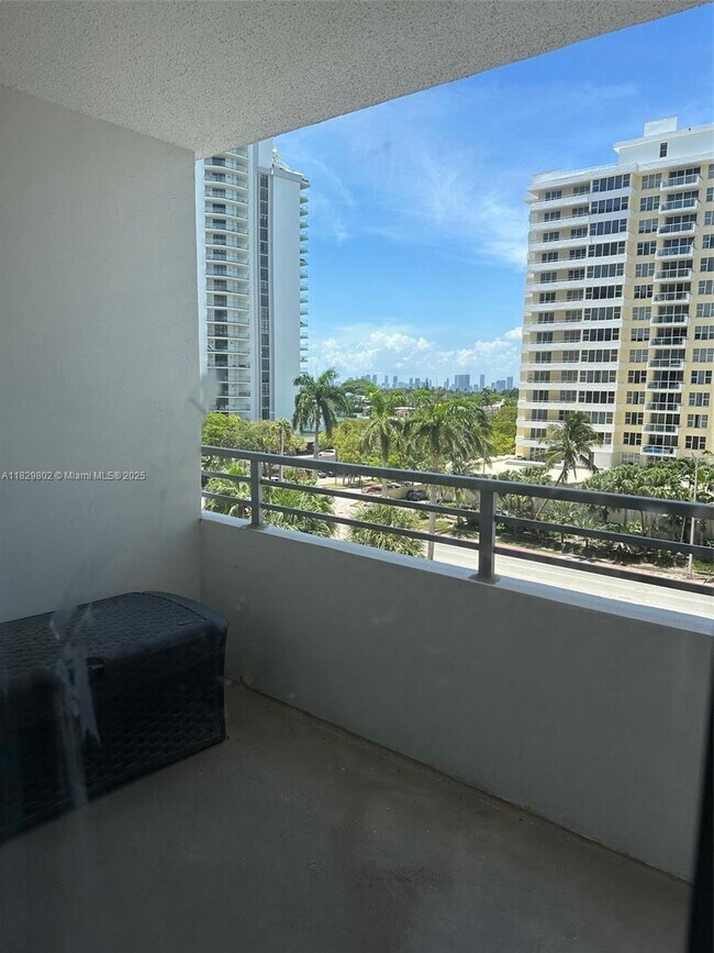 Building Photo - 5555 Collins Ave