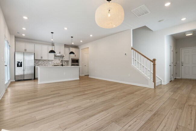 Building Photo - Move-In Ready 4BR Home | Deck, Patio & Open Concept Living