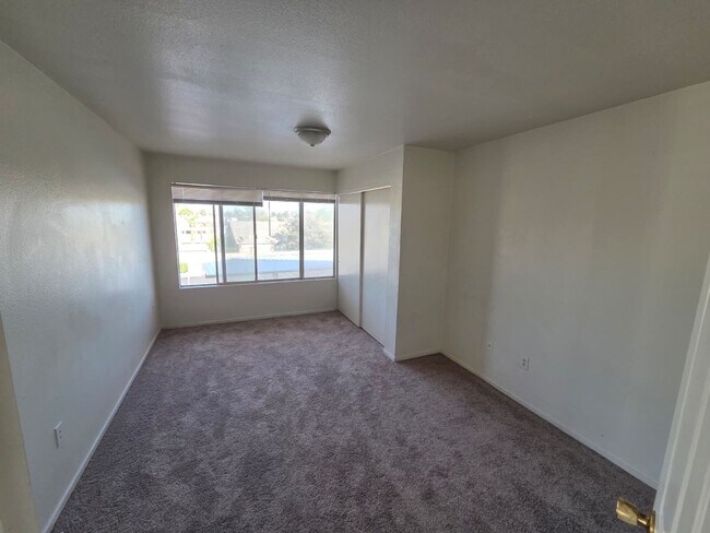Building Photo - Spacious 3-Bedroom, 2-Bath Condo with Priv...